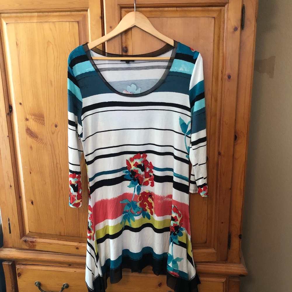 Striped tunic top with unique detailed bottom